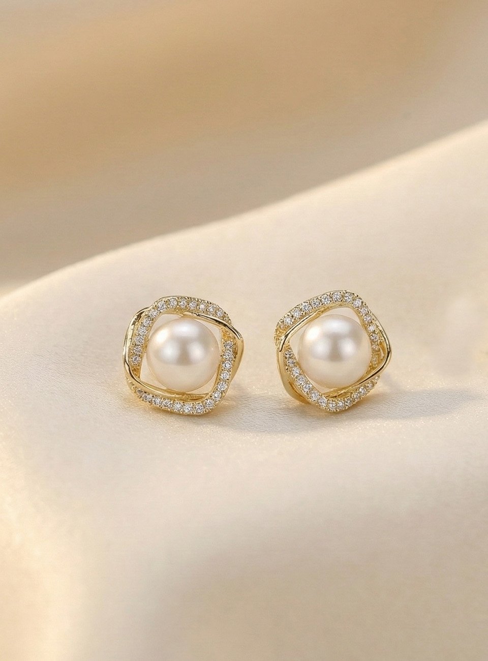Elegant Pavé Crystal & Pearl Swirl Stud Earrings