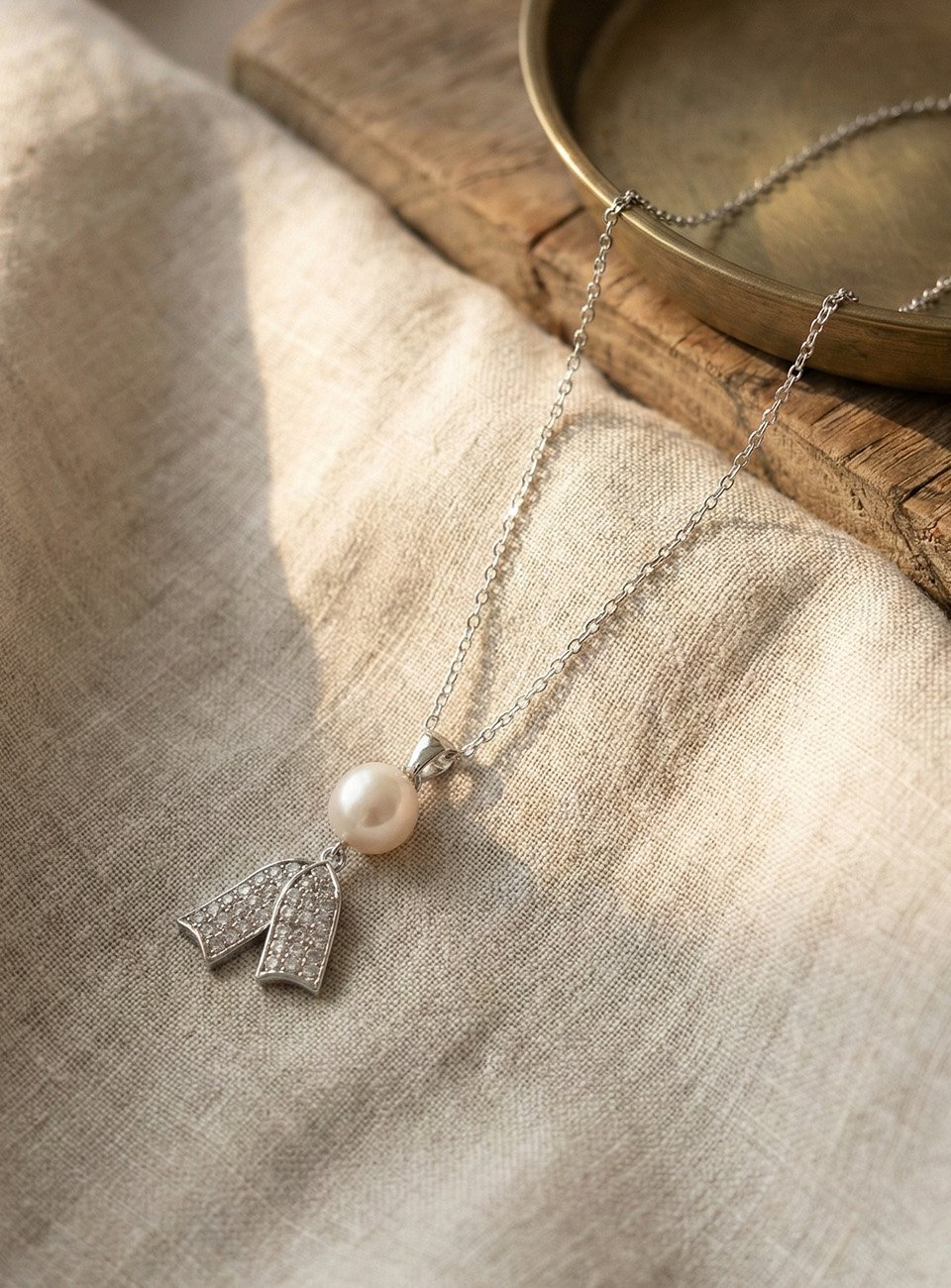 Silver-Tone Pearl Necklace with Pavé Zirconia Ribbon Pendant