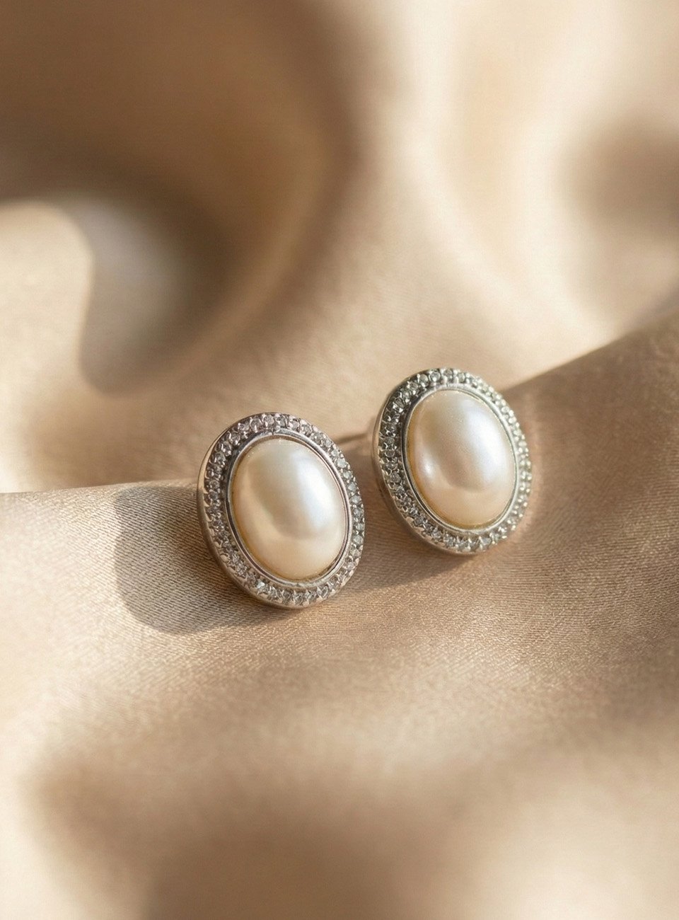 Classic Oval Pearl Stud Earrings with Textured Silver-Tone Border