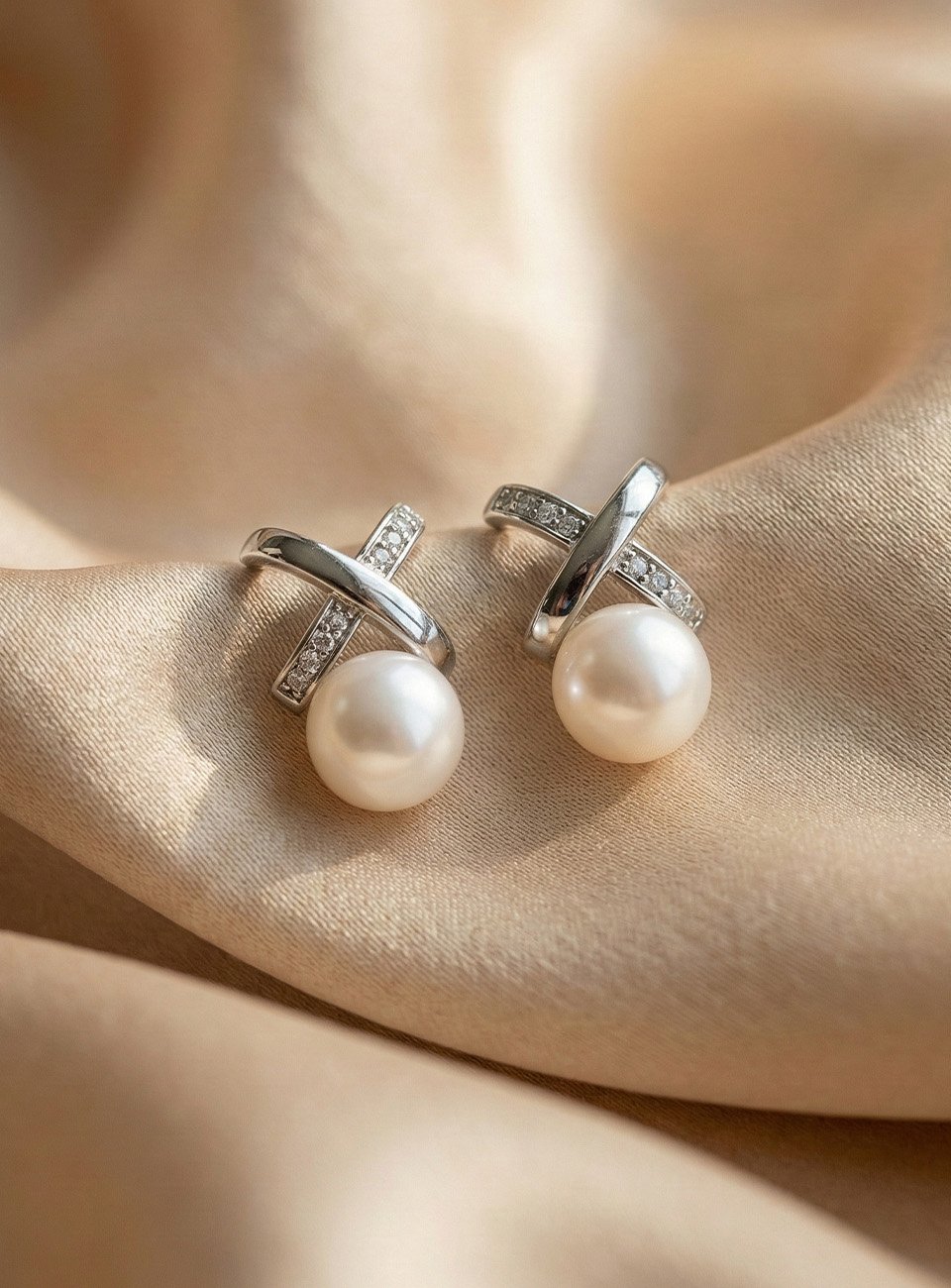 Elegant Criss-Cross Pearl Drop Earrings – Silver Tone with Cubic Zirconia