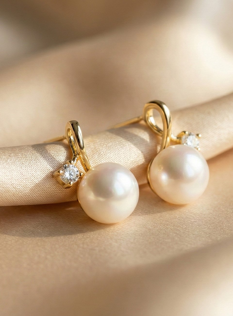 Elegant Mother of Pearl & Crystal Twist Stud Earrings – 18K Gold Plated